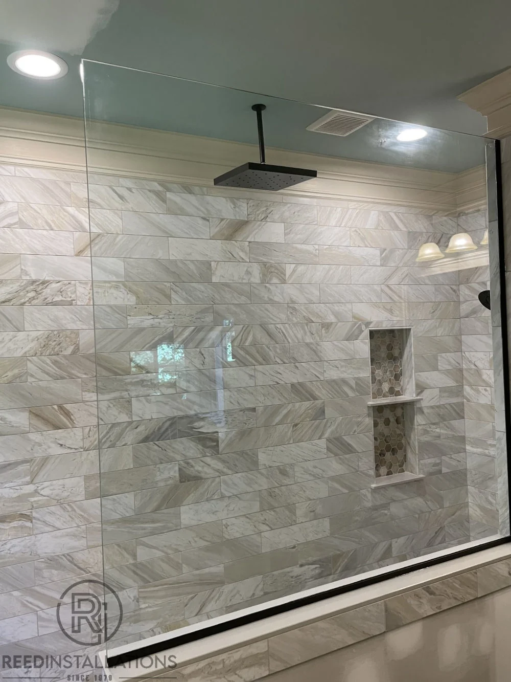 Reed Installations Bespoke Glass, Mirror, and Shower Door Solutions 
