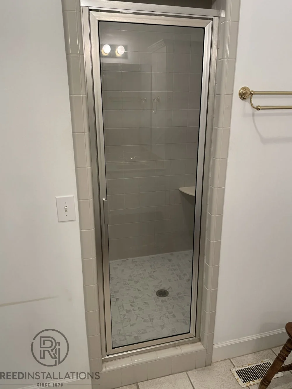 Reed Installations Bespoke Glass, Mirror, and Shower Door Solutions 