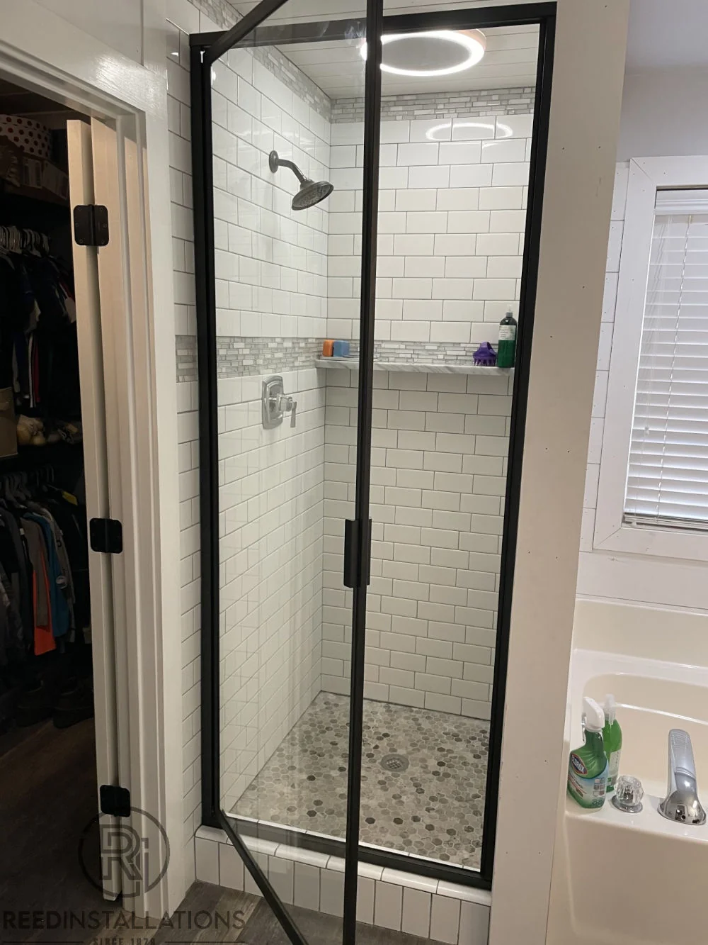 Reed Installations Bespoke Glass, Mirror, and Shower Door Solutions 