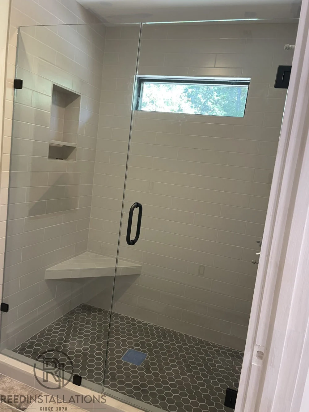 Reed Installations Bespoke Glass, Mirror, and Shower Door Solutions 