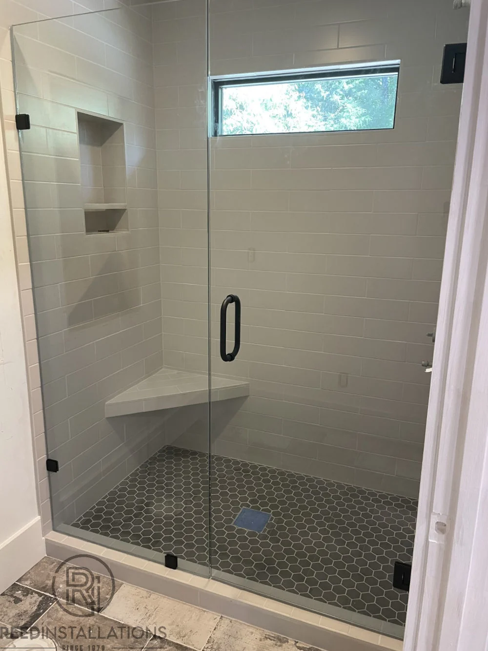 Reed Installations Bespoke Glass, Mirror, and Shower Door Solutions 