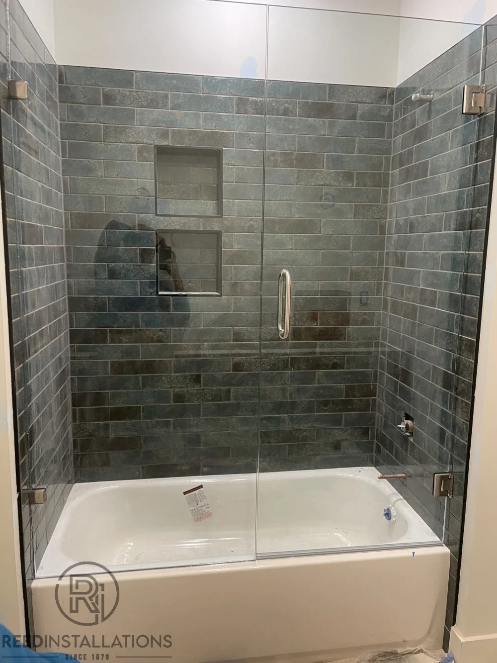 Reed Installations Bespoke Glass, Mirror, and Shower Door Solutions 