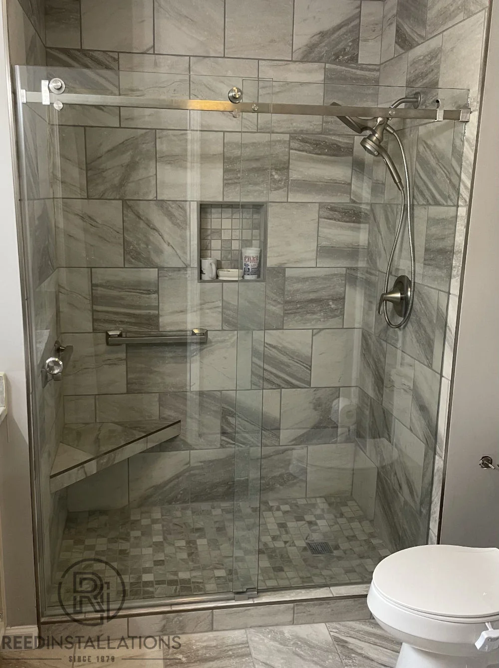 Reed Installations Bespoke Glass, Mirror, and Shower Door Solutions 
