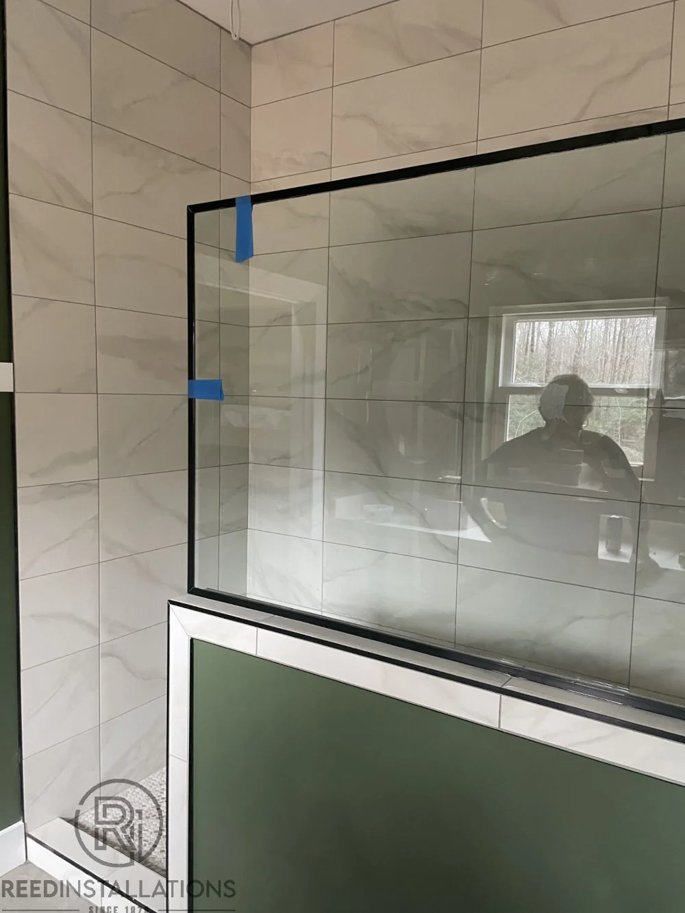 Reed Installations Bespoke Glass, Mirror, and Shower Door Solutions 