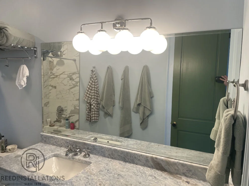 Reed Installations Bespoke Glass, Mirror, and Shower Door Solutions 