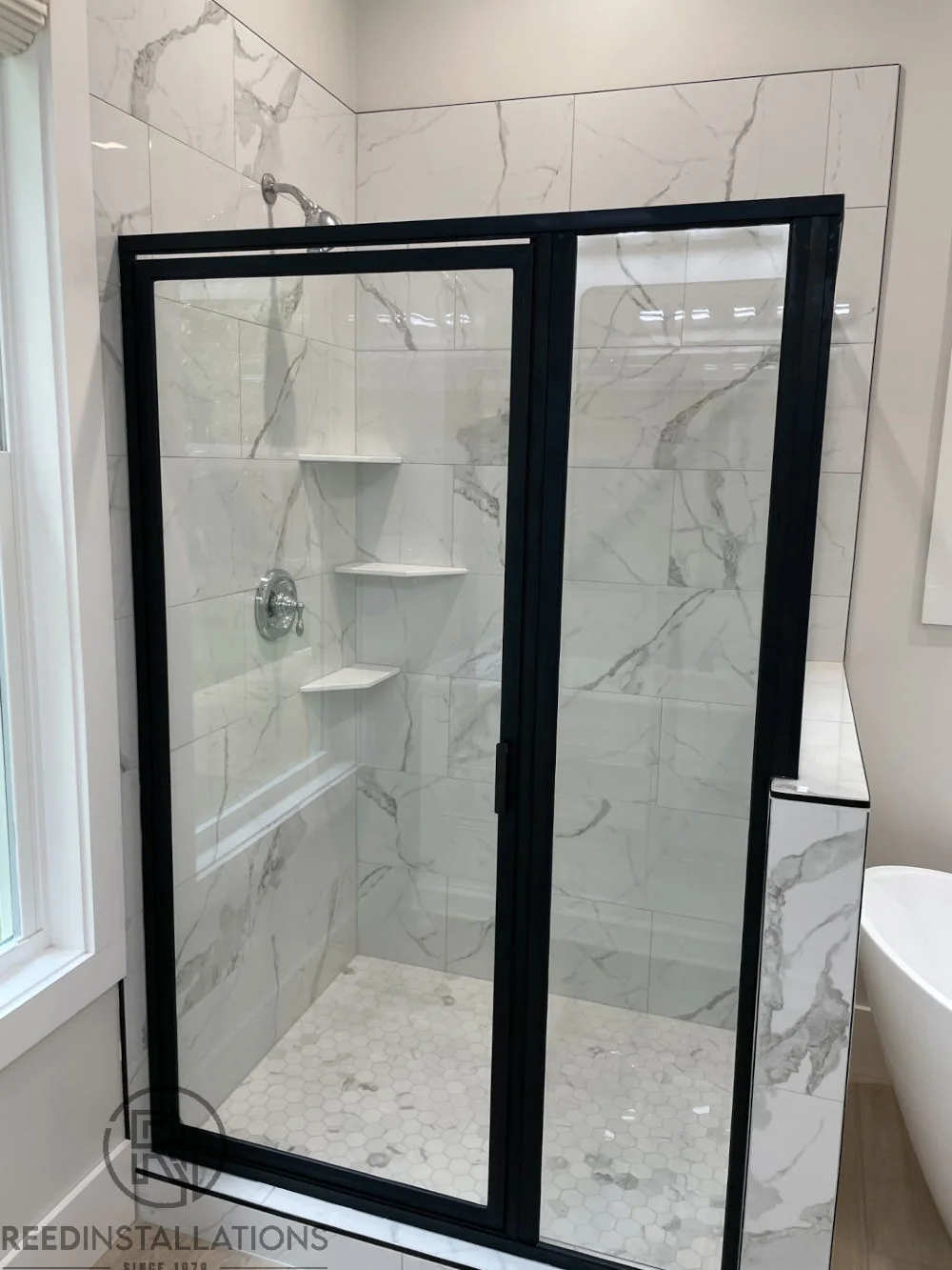Reed Installations Bespoke Glass, Mirror, and Shower Door Solutions 
