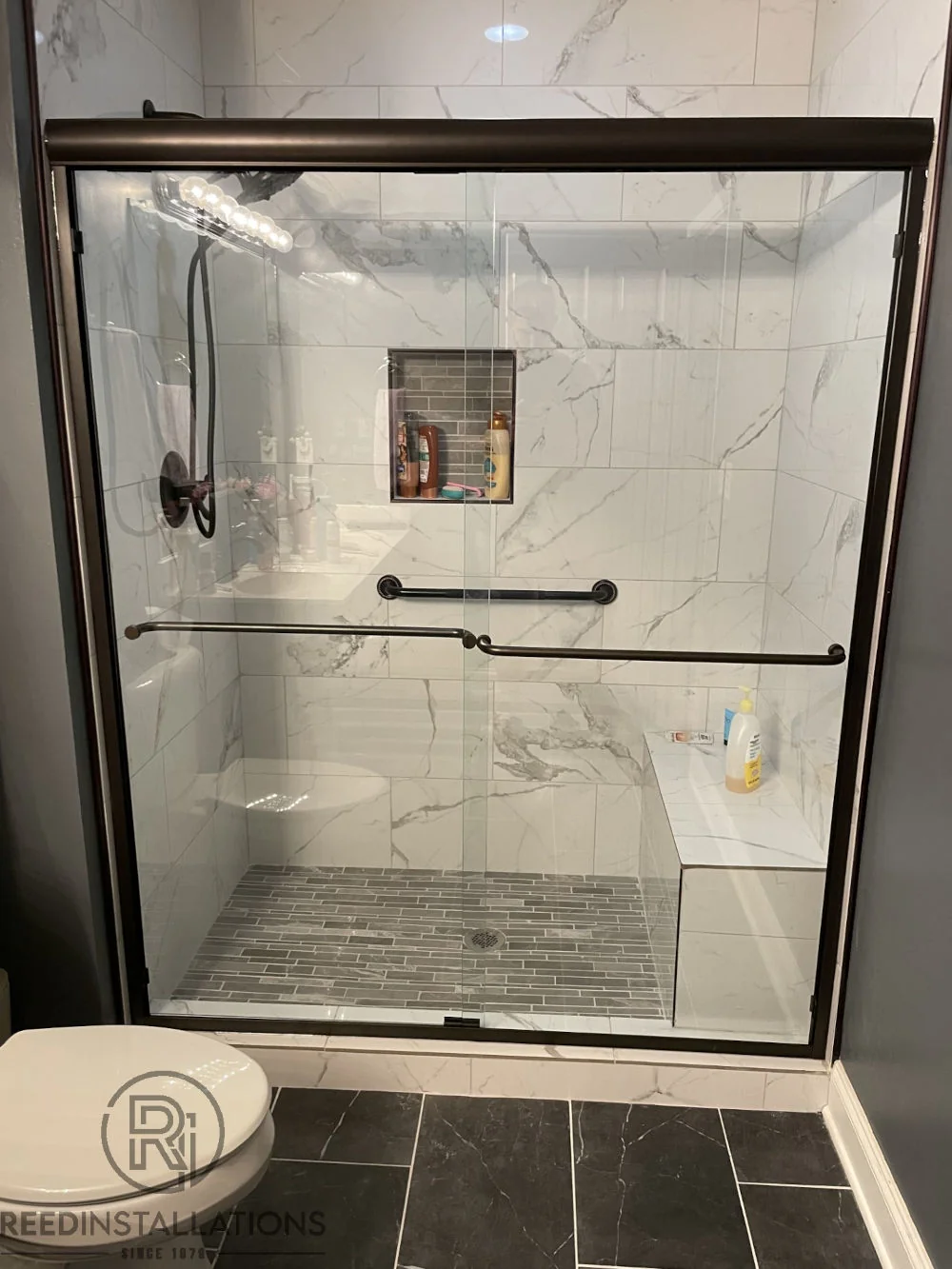 Reed Installations Bespoke Glass, Mirror, and Shower Door Solutions 