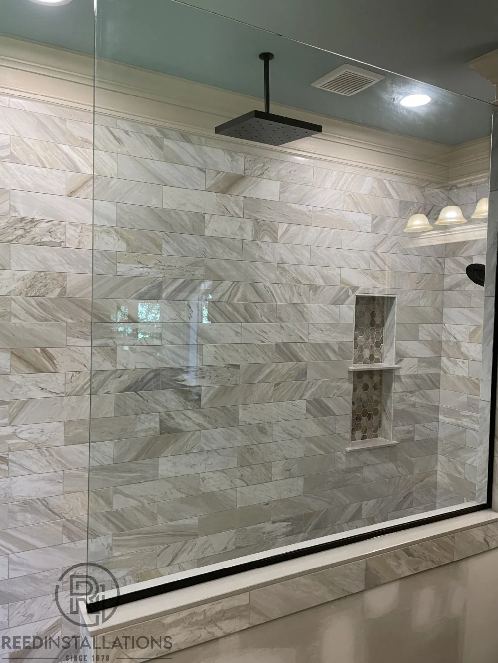 Reed Installations Bespoke Glass, Mirror, and Shower Door Solutions 