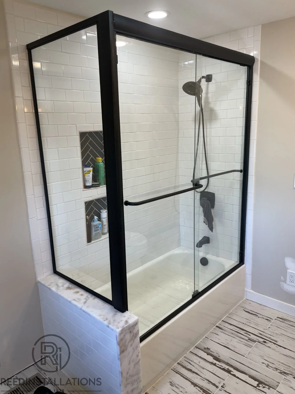 Reed Installations Bespoke Glass, Mirror, and Shower Door Solutions 