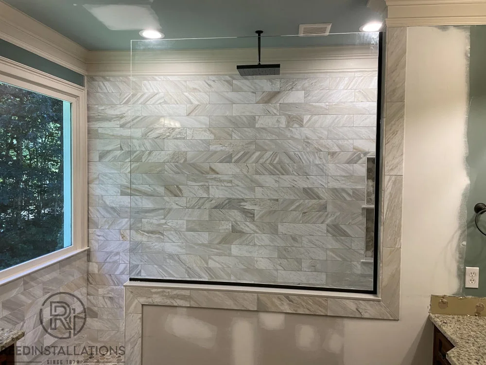 Reed Installations Bespoke Glass, Mirror, and Shower Door Solutions 