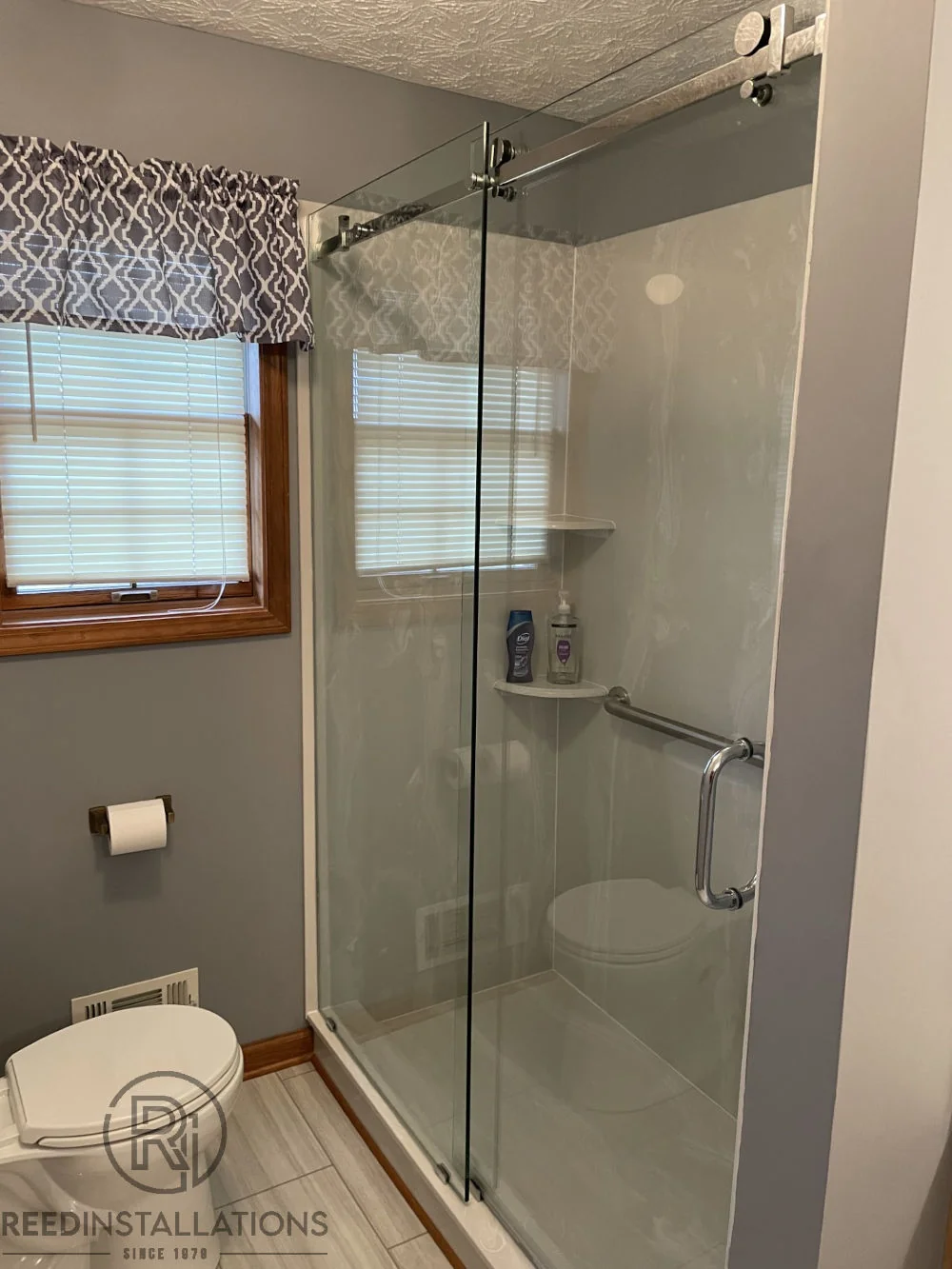 Reed Installations Bespoke Glass, Mirror, and Shower Door Solutions 
