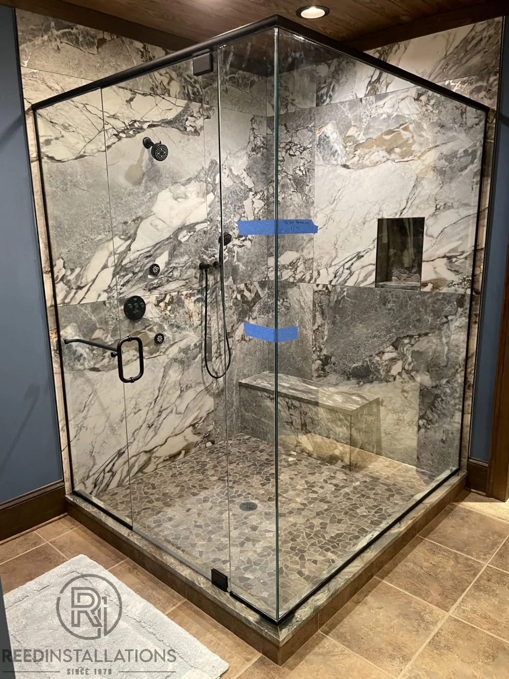 Reed Installations Bespoke Glass, Mirror, and Shower Door Solutions 