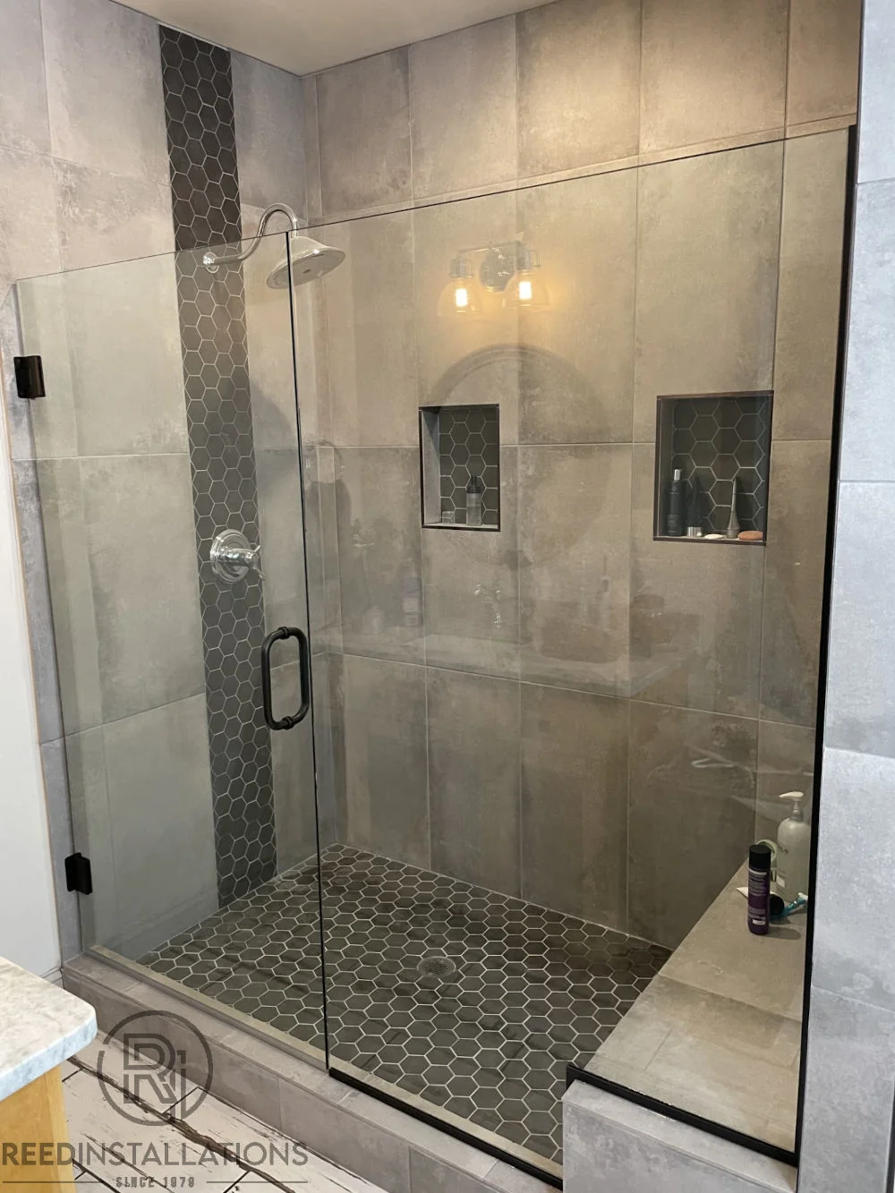 Reed Installations Bespoke Glass, Mirror, and Shower Door Solutions 