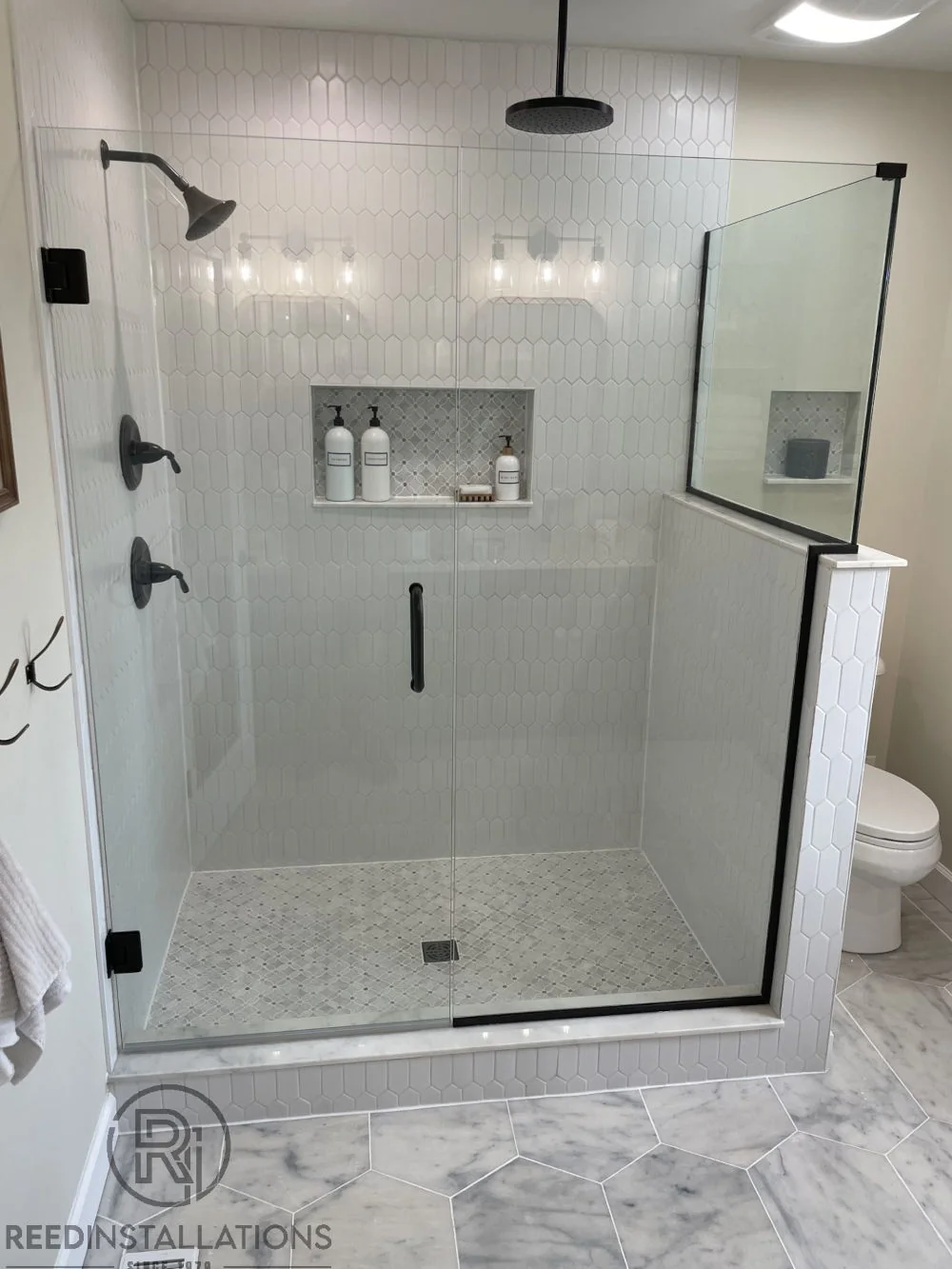 Reed Installations Bespoke Glass, Mirror, and Shower Door Solutions 