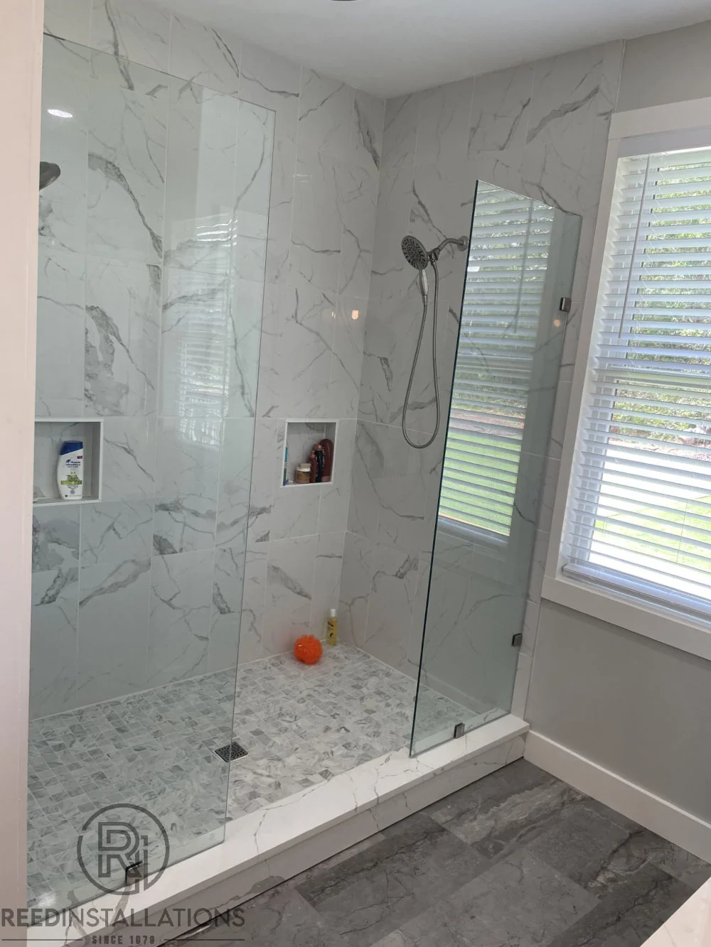 Reed Installations Bespoke Glass, Mirror, and Shower Door Solutions 