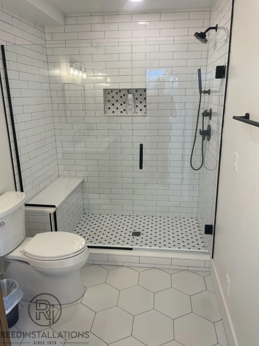 Reed Installations Bespoke Glass, Mirror, and Shower Door Solutions 