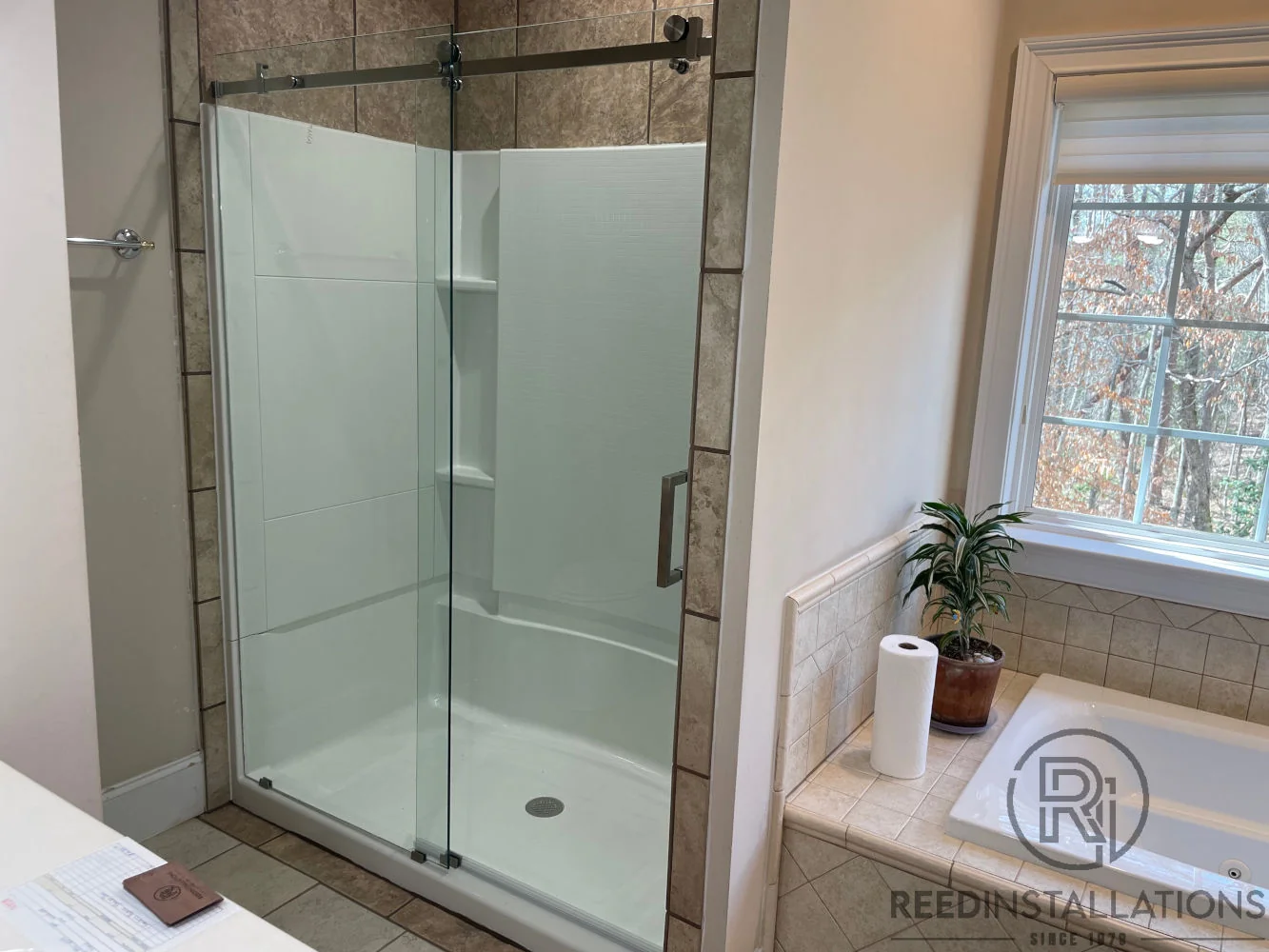 Reed Installations Bespoke Glass, Mirror, and Shower Door Solutions 