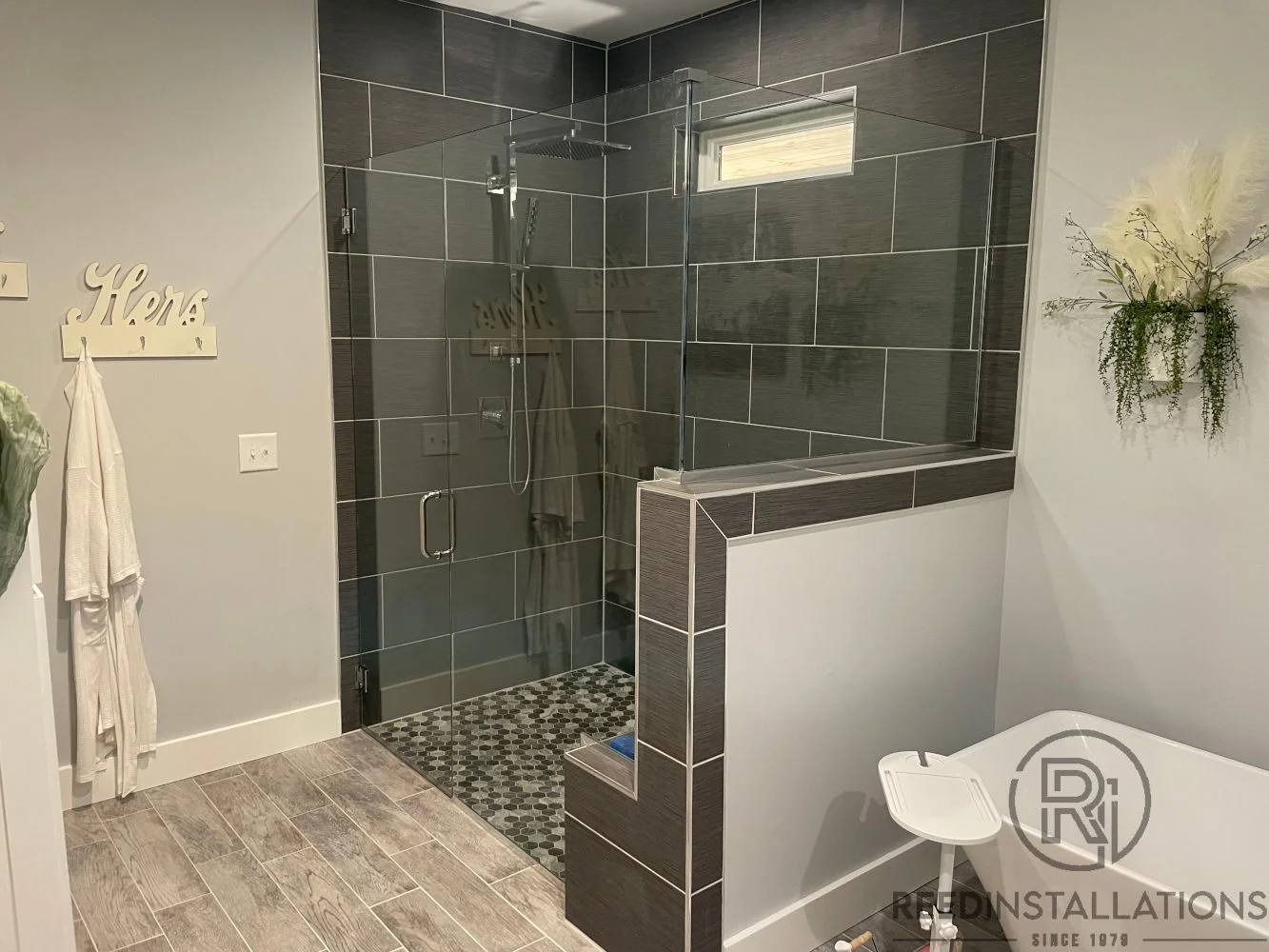 Reed Installations Bespoke Glass, Mirror, and Shower Door Solutions 