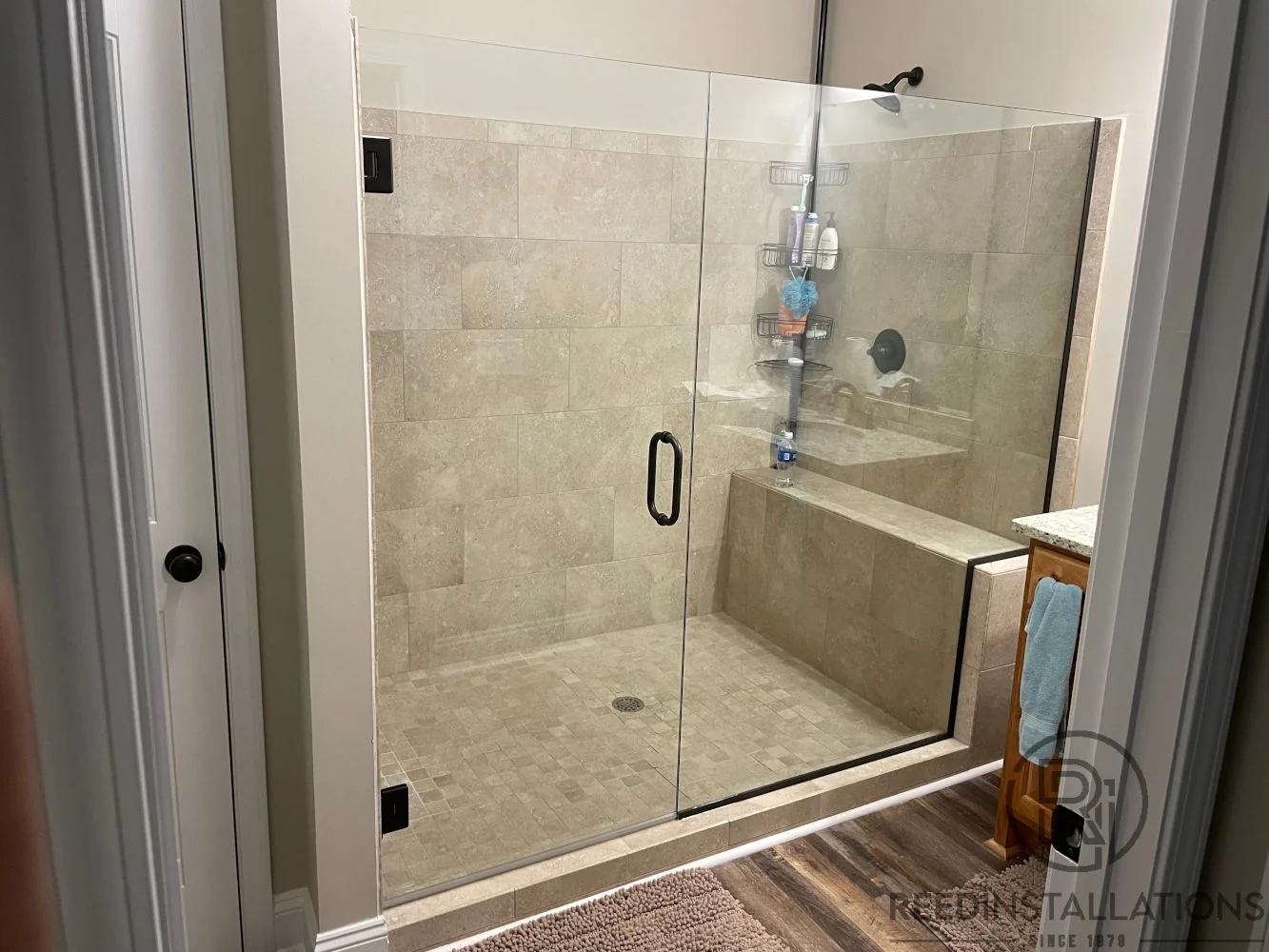 Reed Installations Bespoke Glass, Mirror, and Shower Door Solutions 