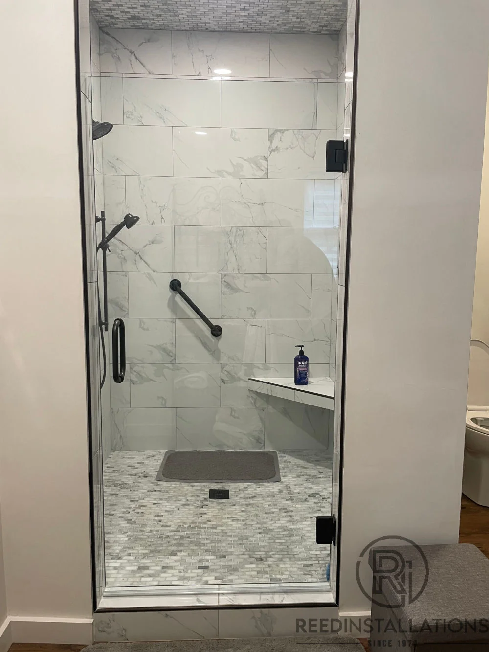 Reed Installations Bespoke Glass, Mirror, and Shower Door Solutions 