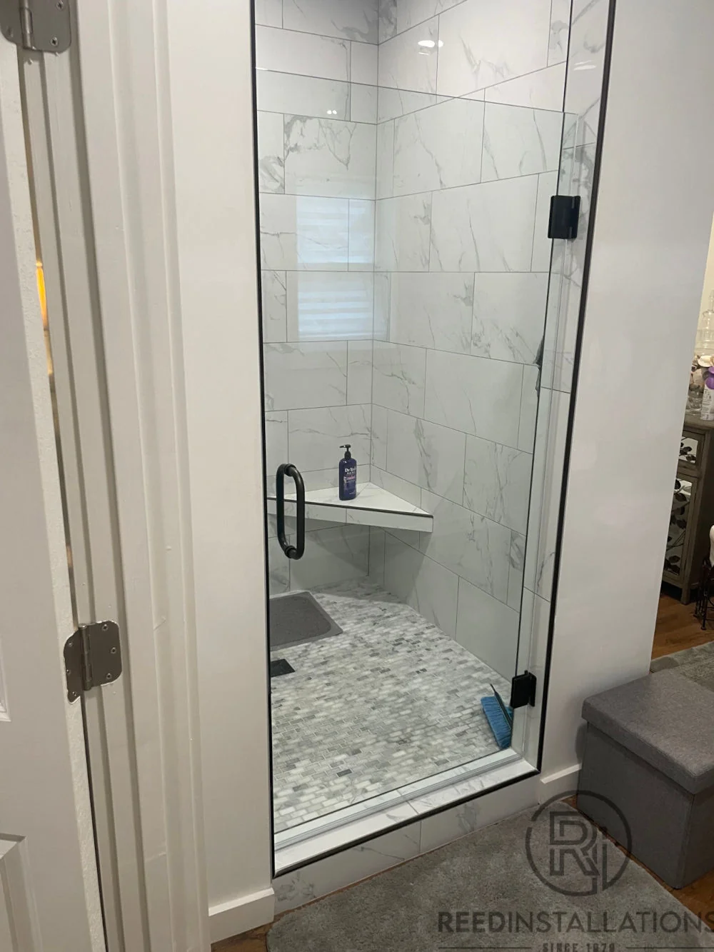 Reed Installations Bespoke Glass, Mirror, and Shower Door Solutions 