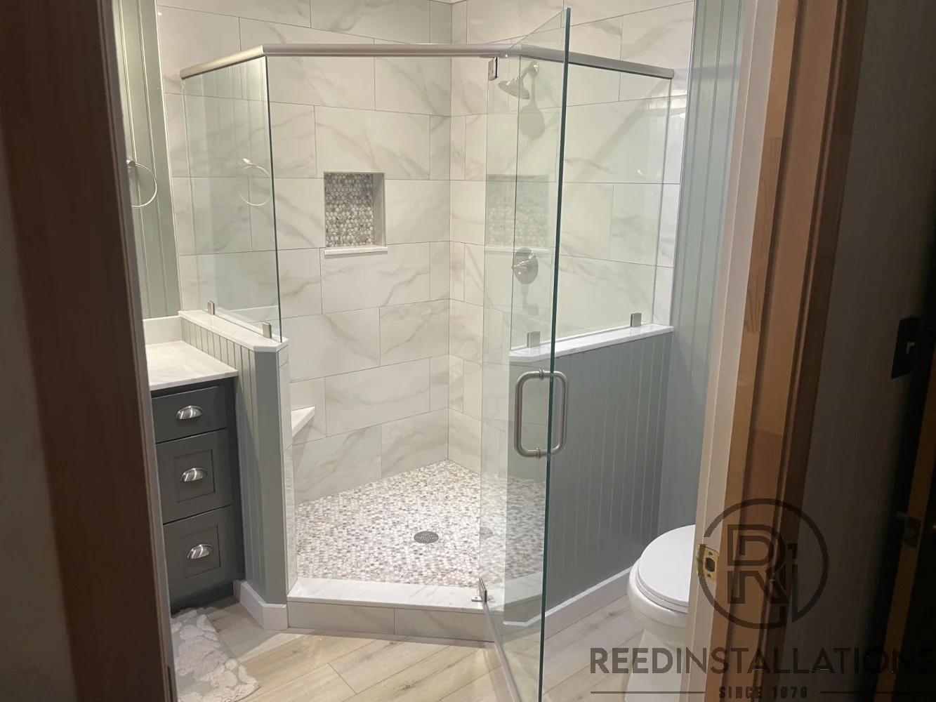Reed Installations Bespoke Glass, Mirror, and Shower Door Solutions 