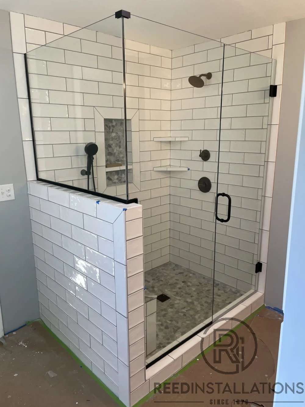 Reed Installations Bespoke Glass, Mirror, and Shower Door Solutions 
