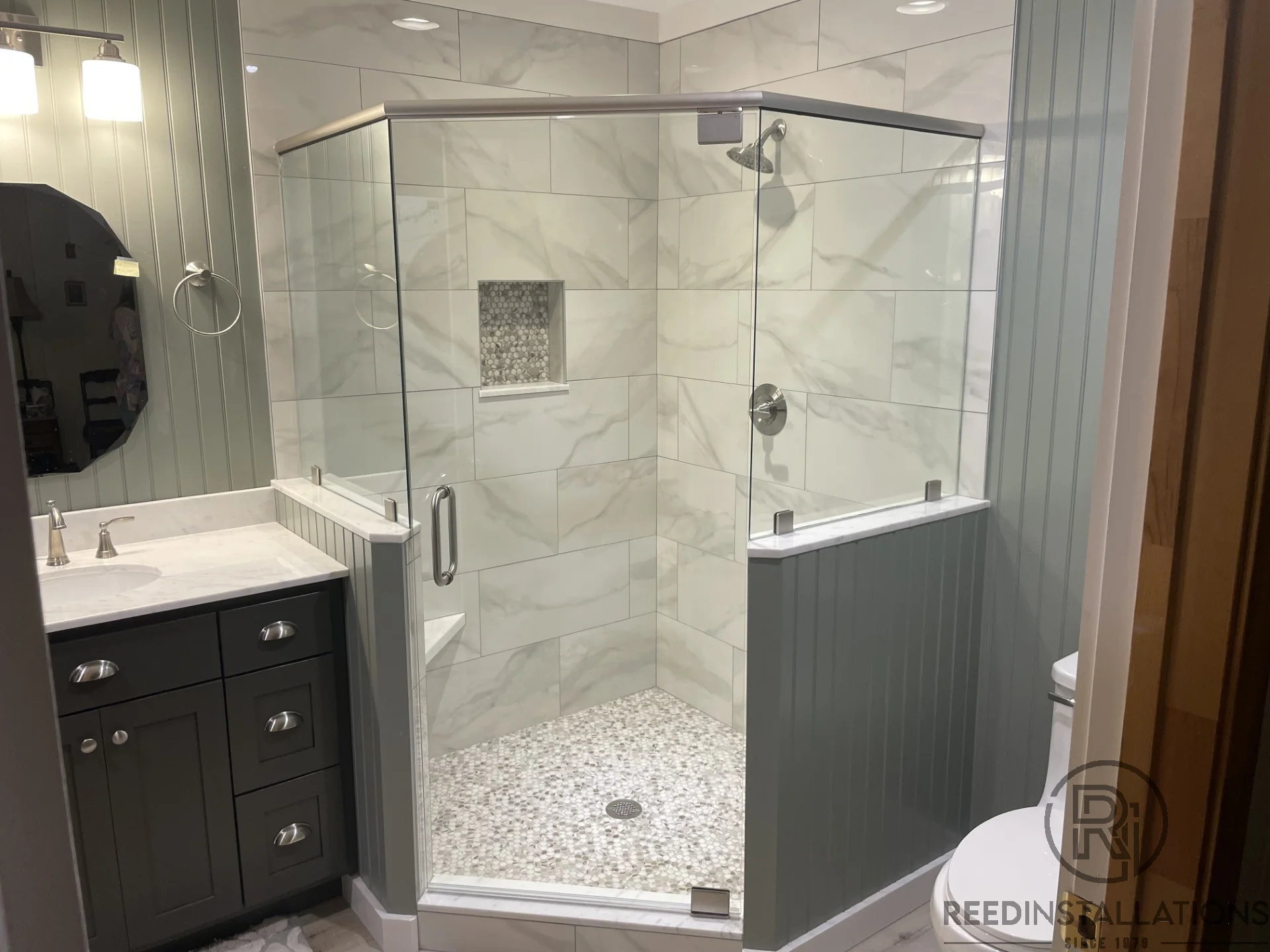 Reed Installations Bespoke Glass, Mirror, and Shower Door Solutions 