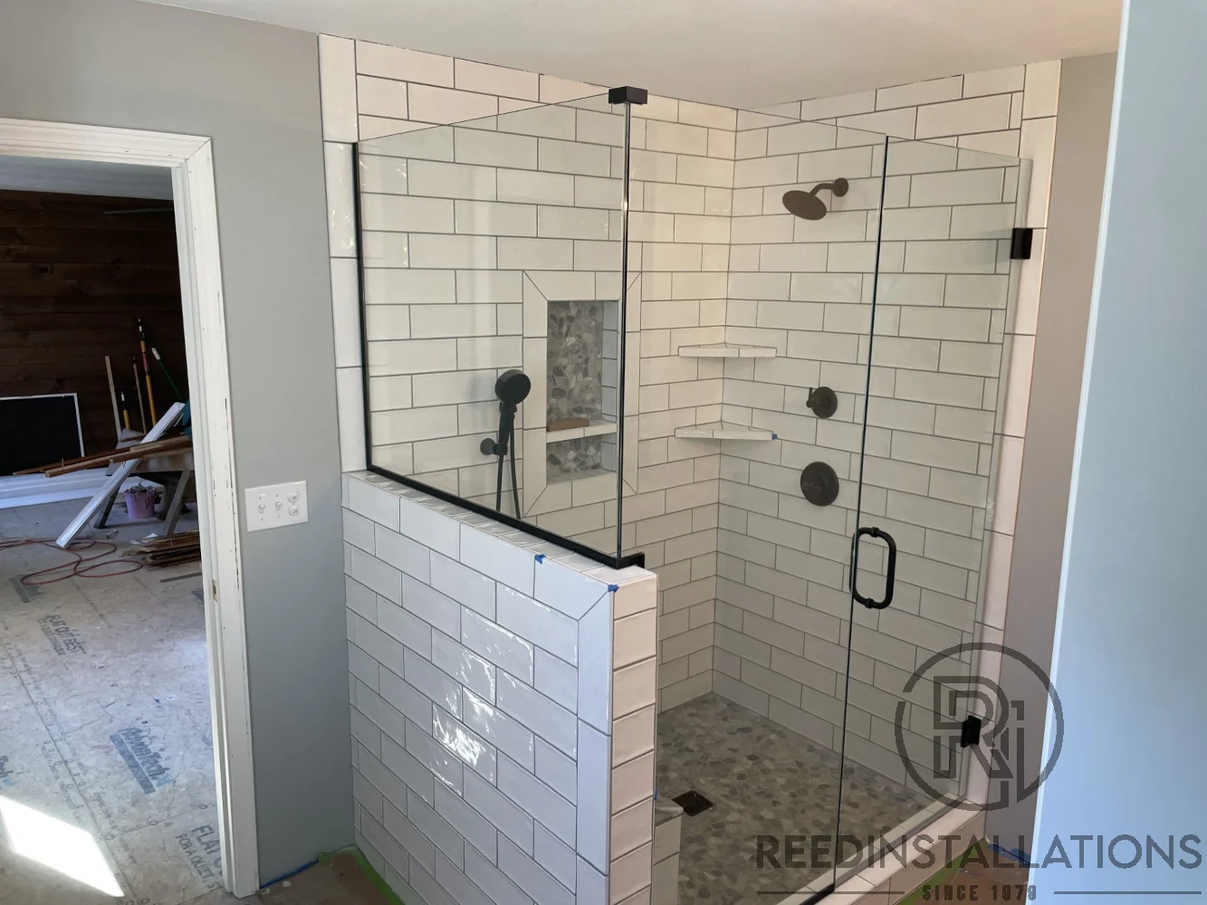 Reed Installations Bespoke Glass, Mirror, and Shower Door Solutions 